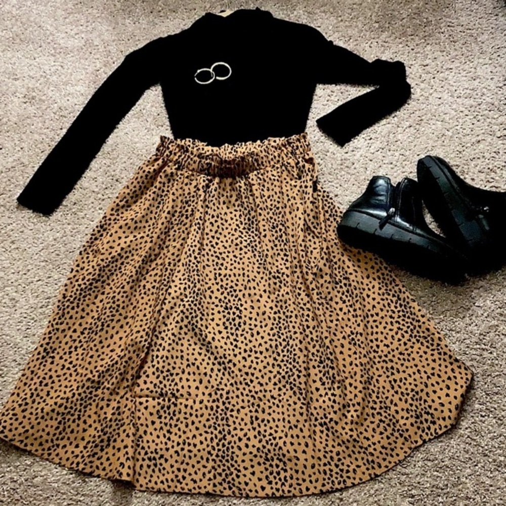 Leopard print skirt with elastic waistband in perfect condition never worn sizeM